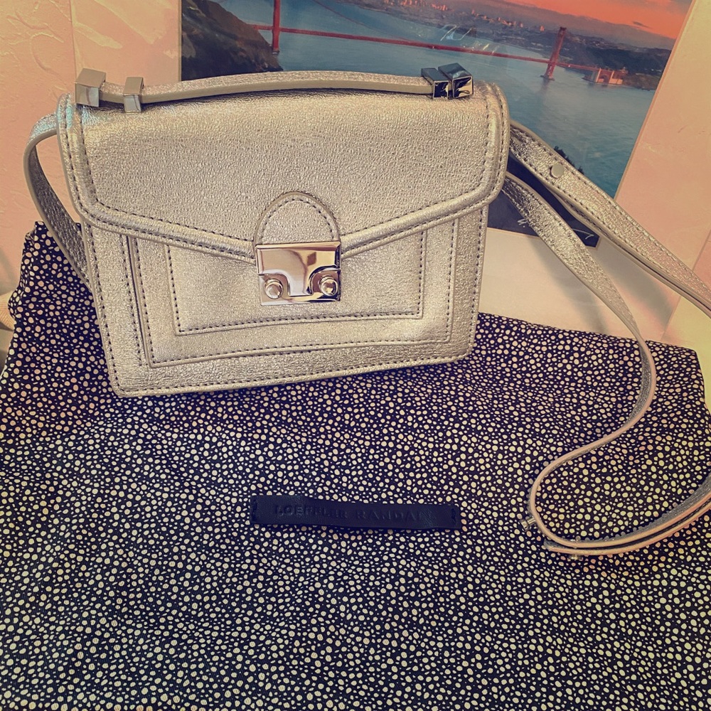 Leoffler Randall silver purse with shoulder strap